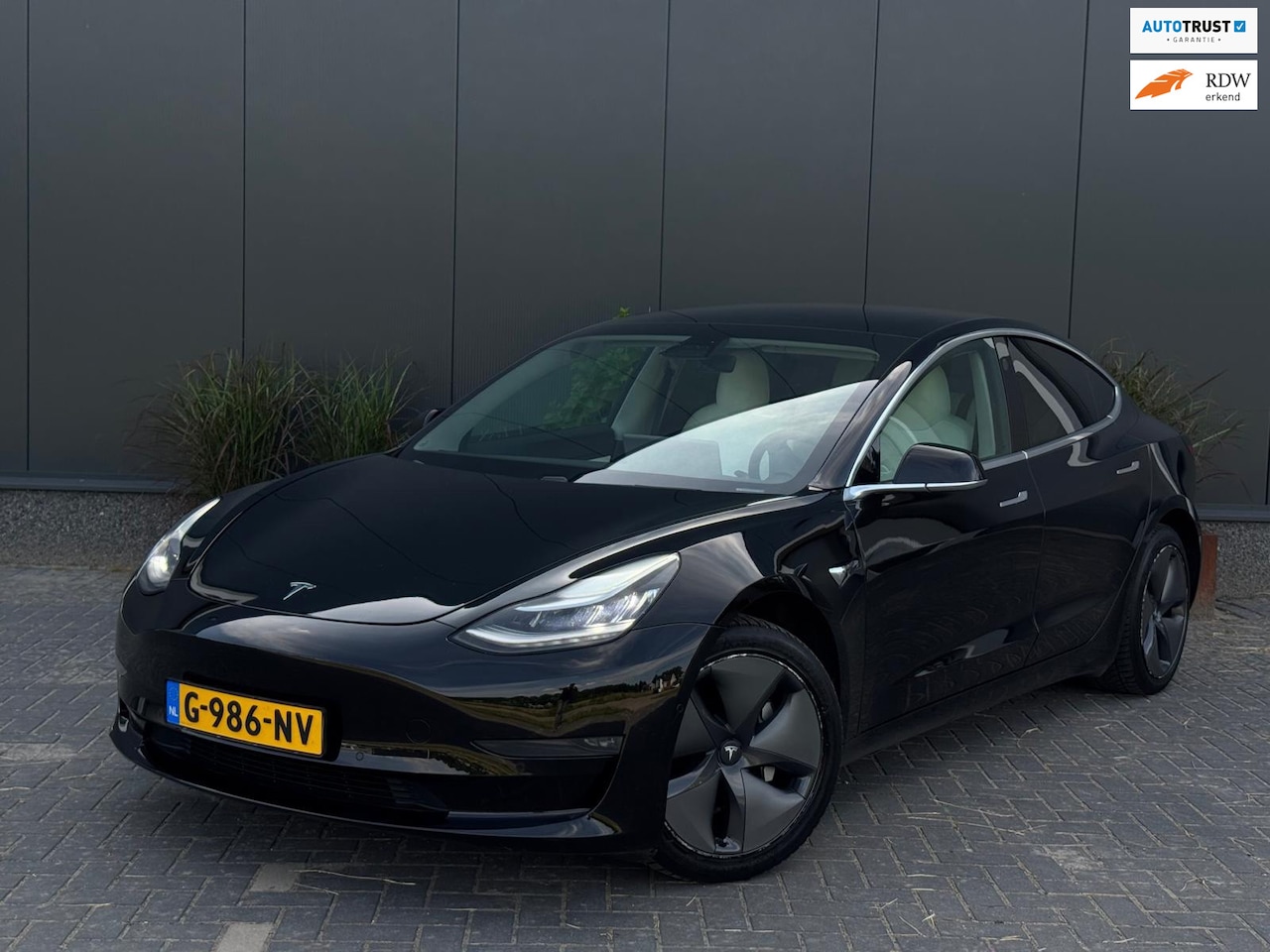 Tesla Model 3 - Long Range RWD Long Range AWD 75 kWh NAVI | LEDER | CAMERA | LED | CR CONTROL - AutoWereld.nl