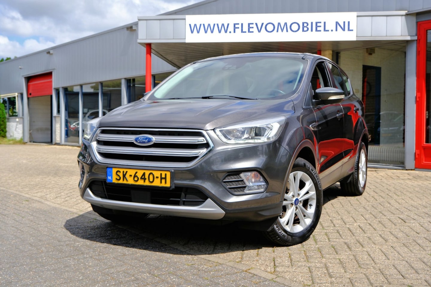 Ford Kuga - 1.5 150pk EcoBoost Titanium Navi|Clima|Adapt.Cruise|LMV|Half Leder - AutoWereld.nl
