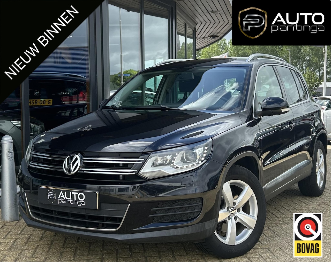 Volkswagen Tiguan - 2.0 TSI Track&Field 4Motion 179PK | Trekhaak | 2200KG TREKGEWICHT! | Parkeersensoren | Ach - AutoWereld.nl