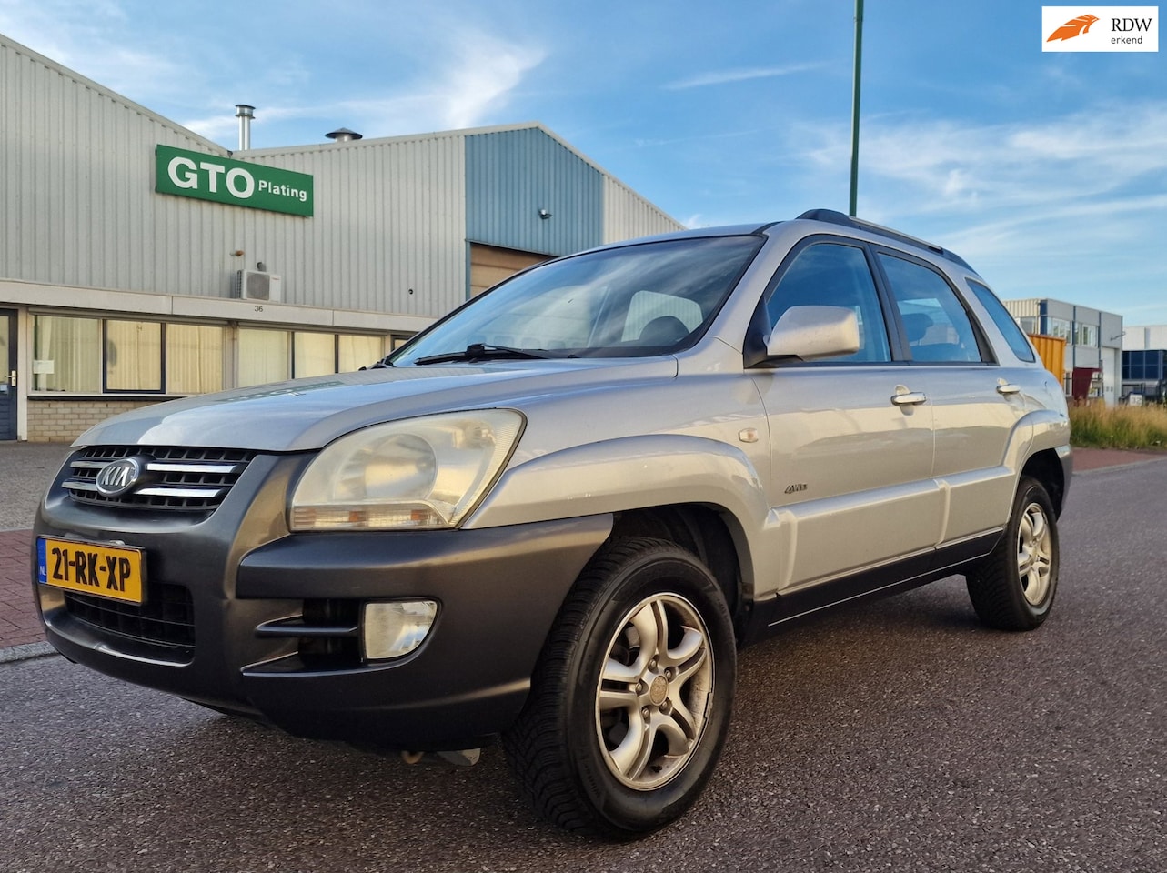 Kia Sportage - 2.0 CVVT Adventure 4WD AIRCO CRUISE TREKHAAK - AutoWereld.nl
