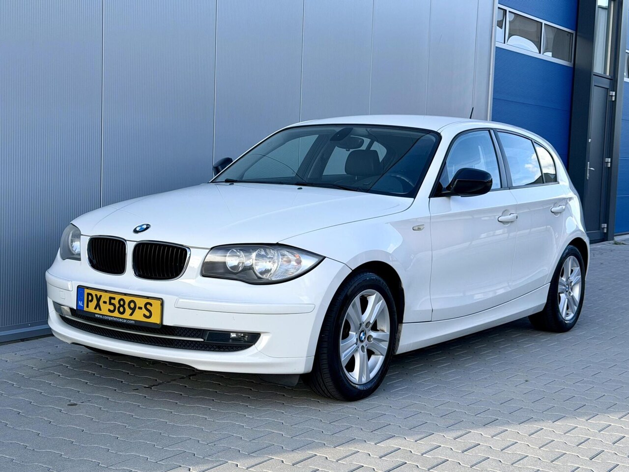 BMW 1-serie - 118i High Executive - Automaat - Leder - Navi - AutoWereld.nl