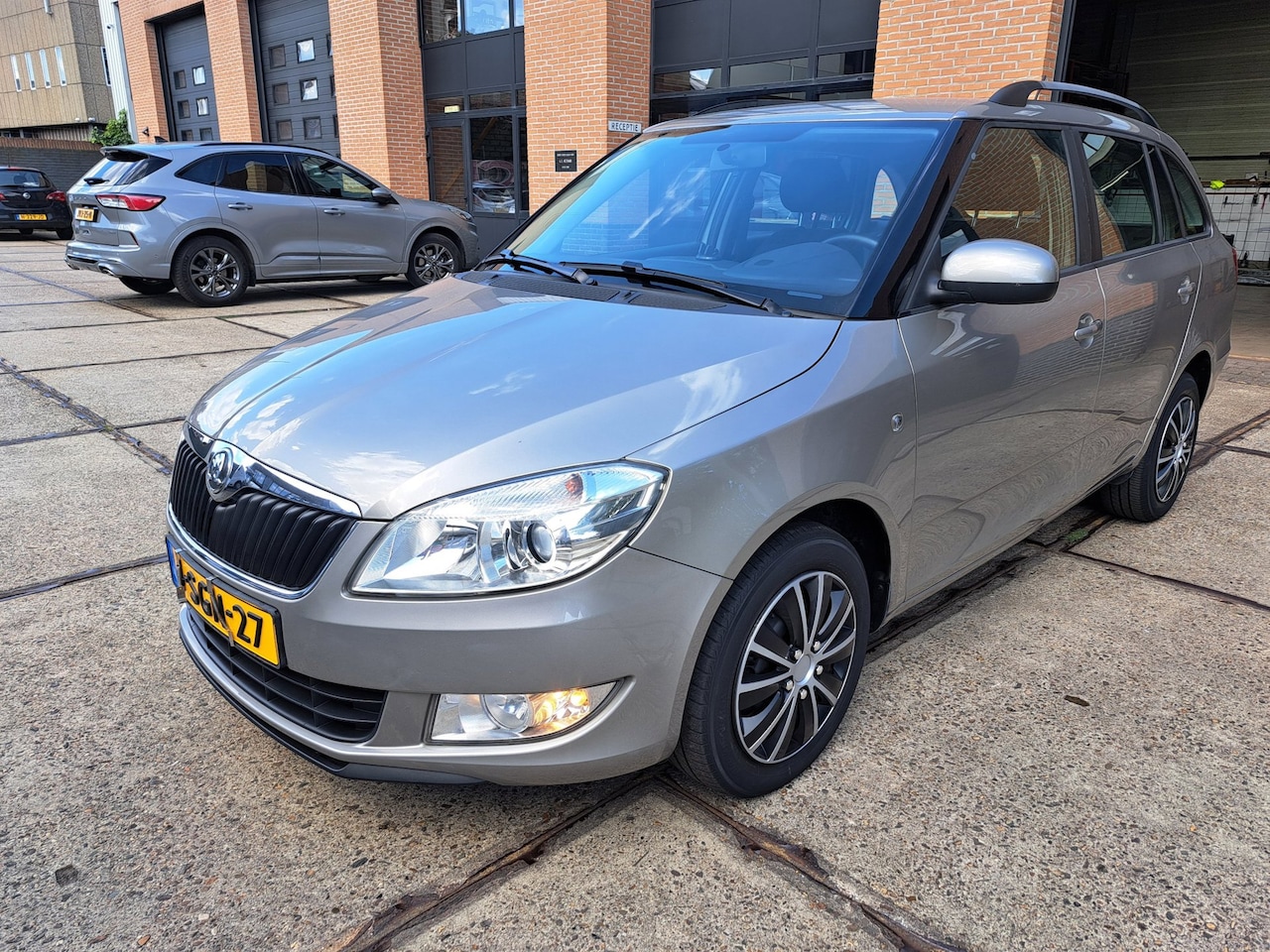 Skoda Fabia Combi - 1.2 TSI 5 DEURS STATION NIEUWSTAAT AIRCO NAVIGATIE - AutoWereld.nl