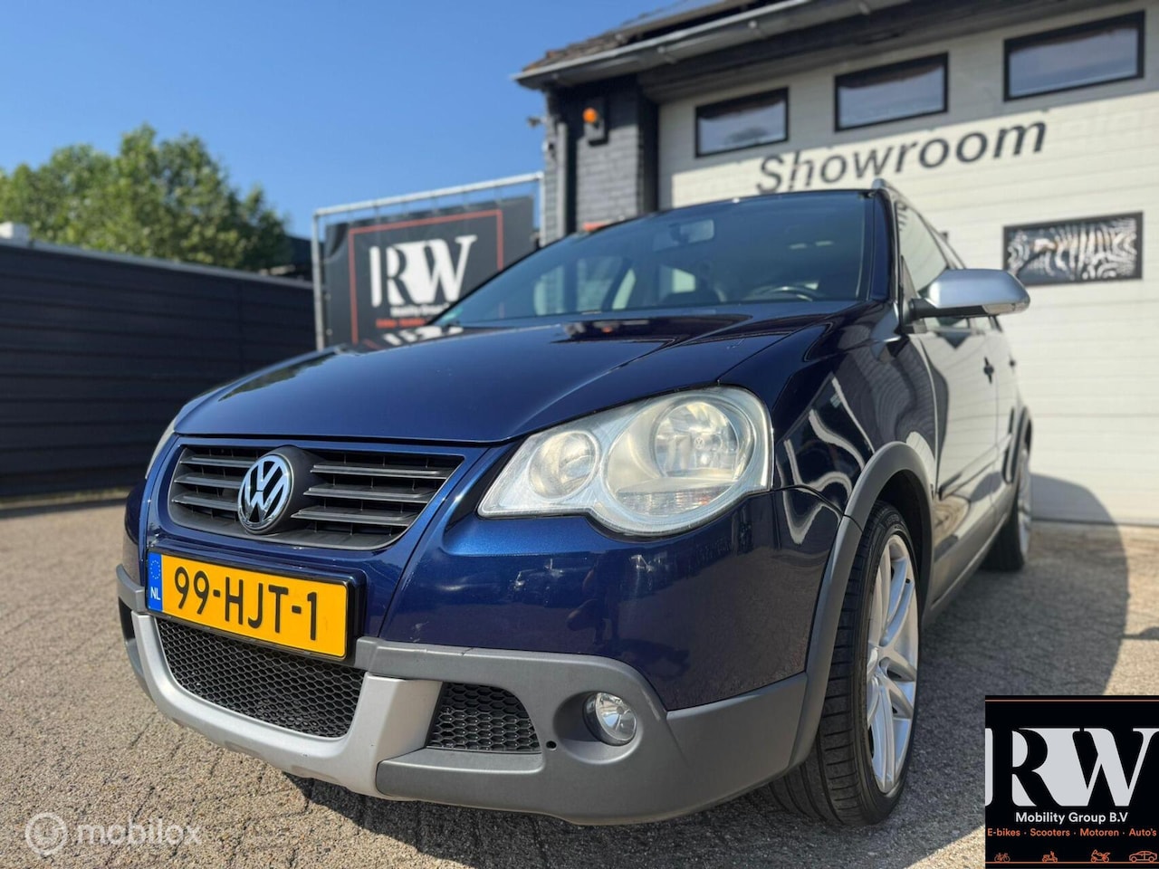 Volkswagen Polo - 1.2-12V Cross *NAP*CRUISE*A/C*TREKHAAK* - AutoWereld.nl
