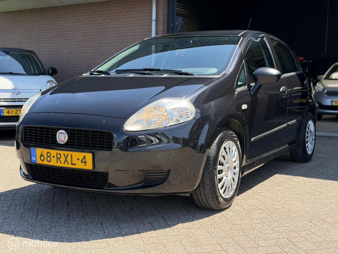 Fiat Grande Punto - 1.2 Actual DEALER OH|AIRCO|5 DRS|LAGE KM!! - AutoWereld.nl