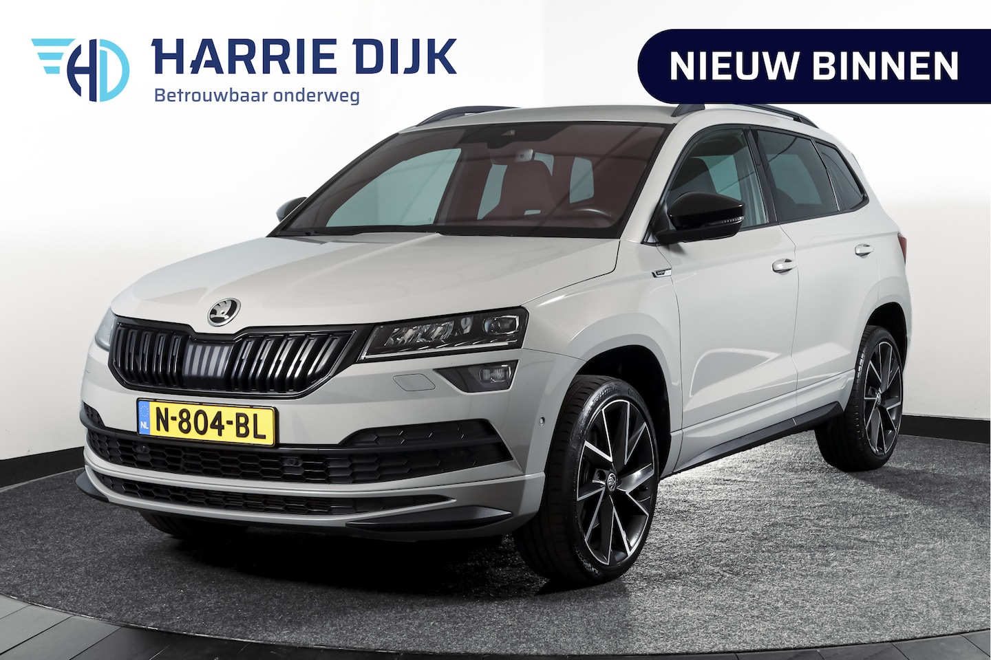 Skoda Karoq - 1.5 TSI ACT Sportline Business 150 PK | Dig. Cockpit | Adapt. Cruise | Winterpakket | PDC - AutoWereld.nl