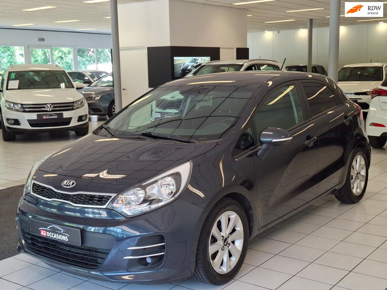 Kia Rio - 1.2 CVVT Clima/Cruise/Bluetooth/PDC/ - AutoWereld.nl