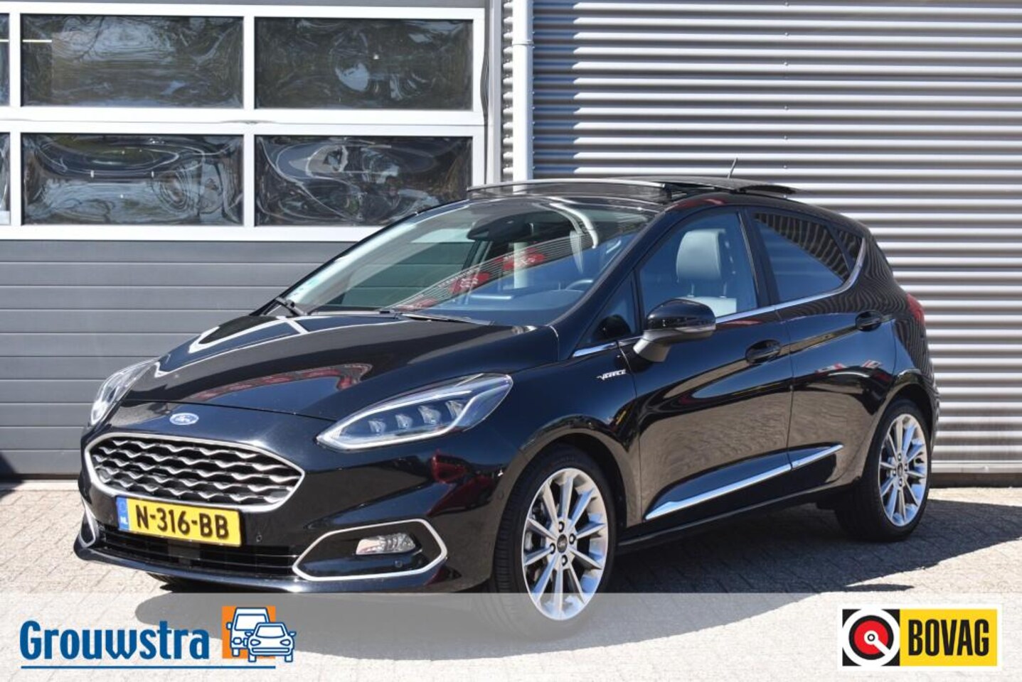 Ford Fiesta - 1.0 ECOBOOST HYBRID /  VIGNALE / LEDER / AUTOMAAT / PANO DAK - AutoWereld.nl