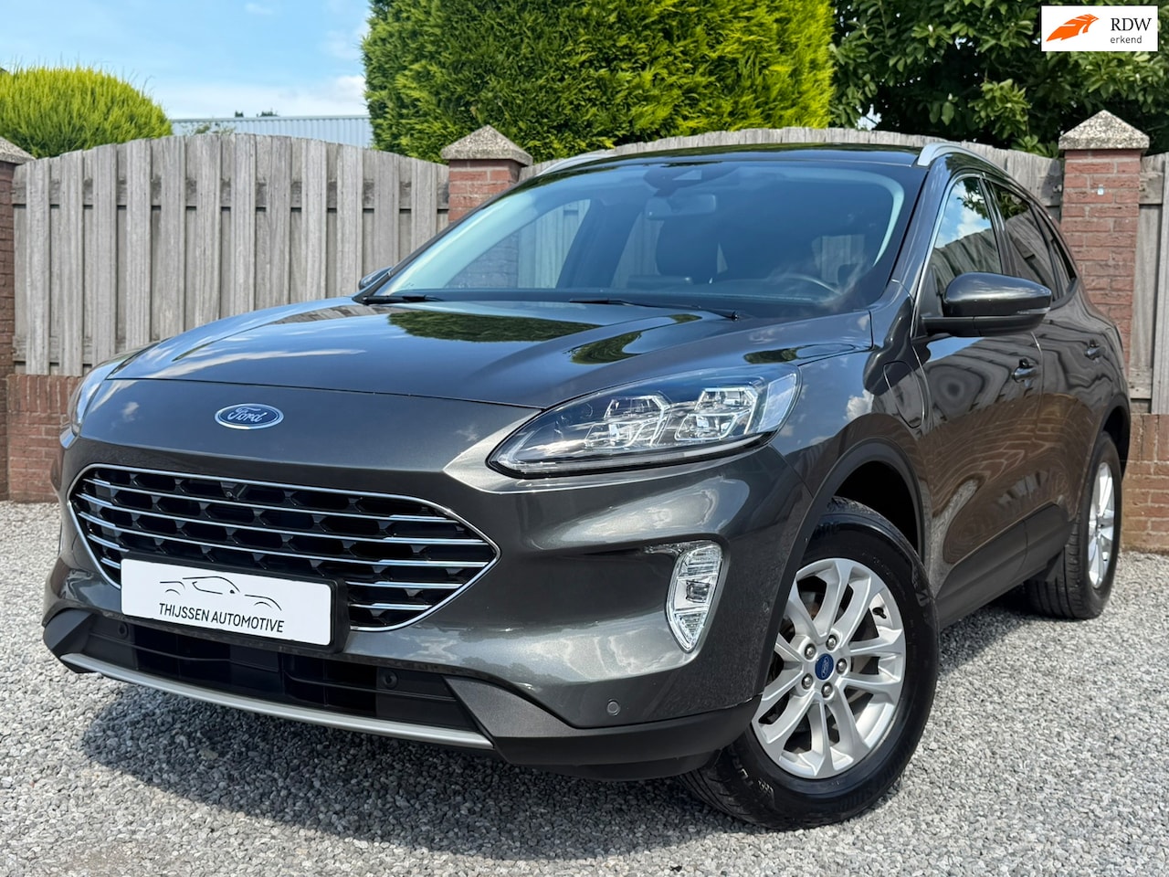 Ford Kuga - 2.5 PHEV Titanium X HALF LEER E-STOELEN P-CAMERA STOELVERWARMING STUURVERWARMING ECC NAVI - AutoWereld.nl