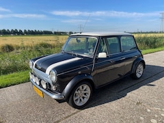 MINI Cooper - 1.3 volledig gerestaureerd , tax. rapport aanwezig