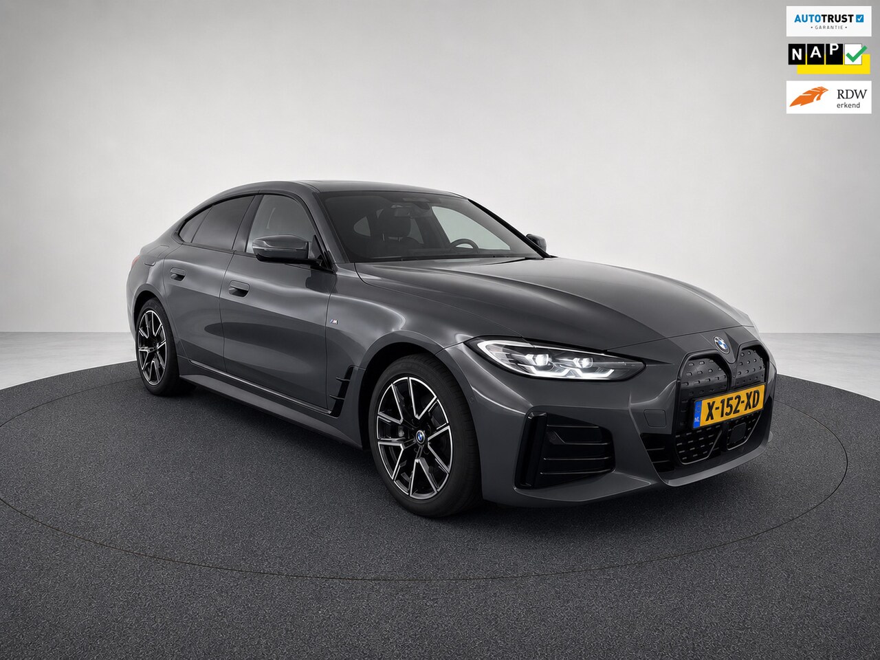 BMW i4 - 40 84 kWh High Executive M-SPORT l SOH 96,4% l H/K l HUD l 360 l SCHUIFDAK l DRAVITGRAU l - AutoWereld.nl