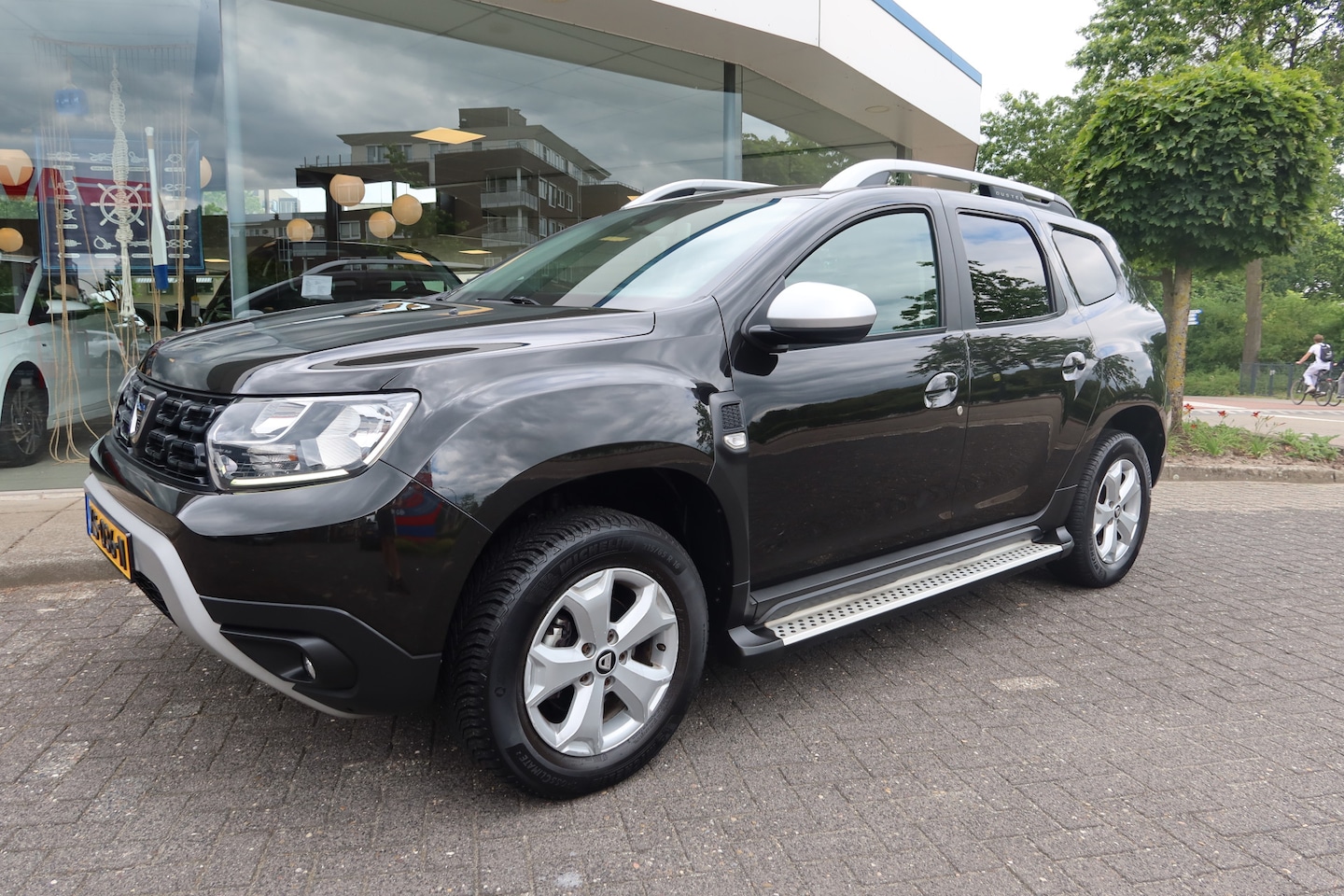 Dacia Duster - 1.2 TCe Comfort AIRCO I ALL-SEASON I TREKHAAK - AutoWereld.nl