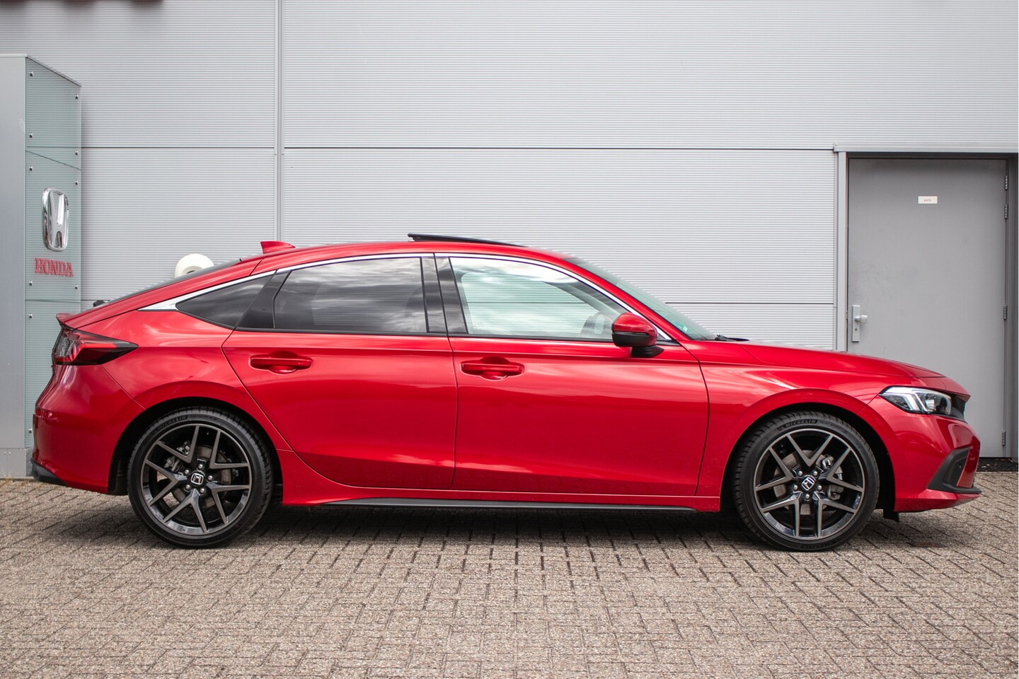 Honda Civic - 2.0 e:HEV Advance - Leder | Schuifdak | Carplay | Ad. cruise - AutoWereld.nl