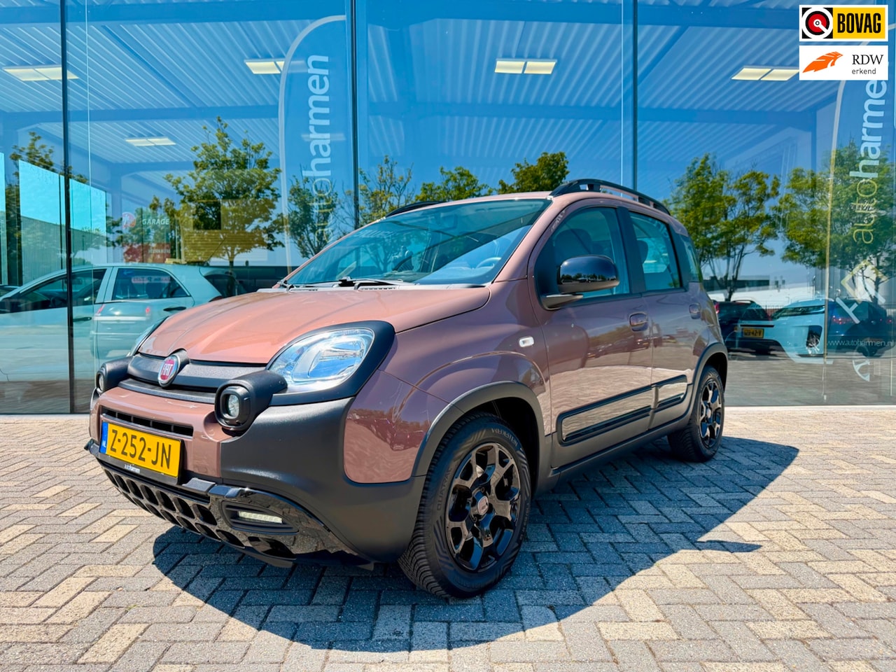 Fiat Panda - 1.2 TRUSSARDI Cross, Climate, PDC - AutoWereld.nl