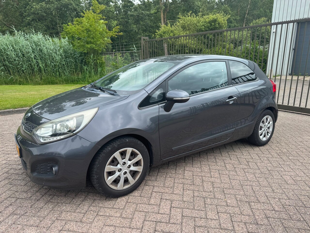 Kia Rio - 1.2 CVVT Plus Pack/NWE APK/CLIMA/APPLECARPLAY/CRUISE/ELEKTRISCHE RAMEN - AutoWereld.nl
