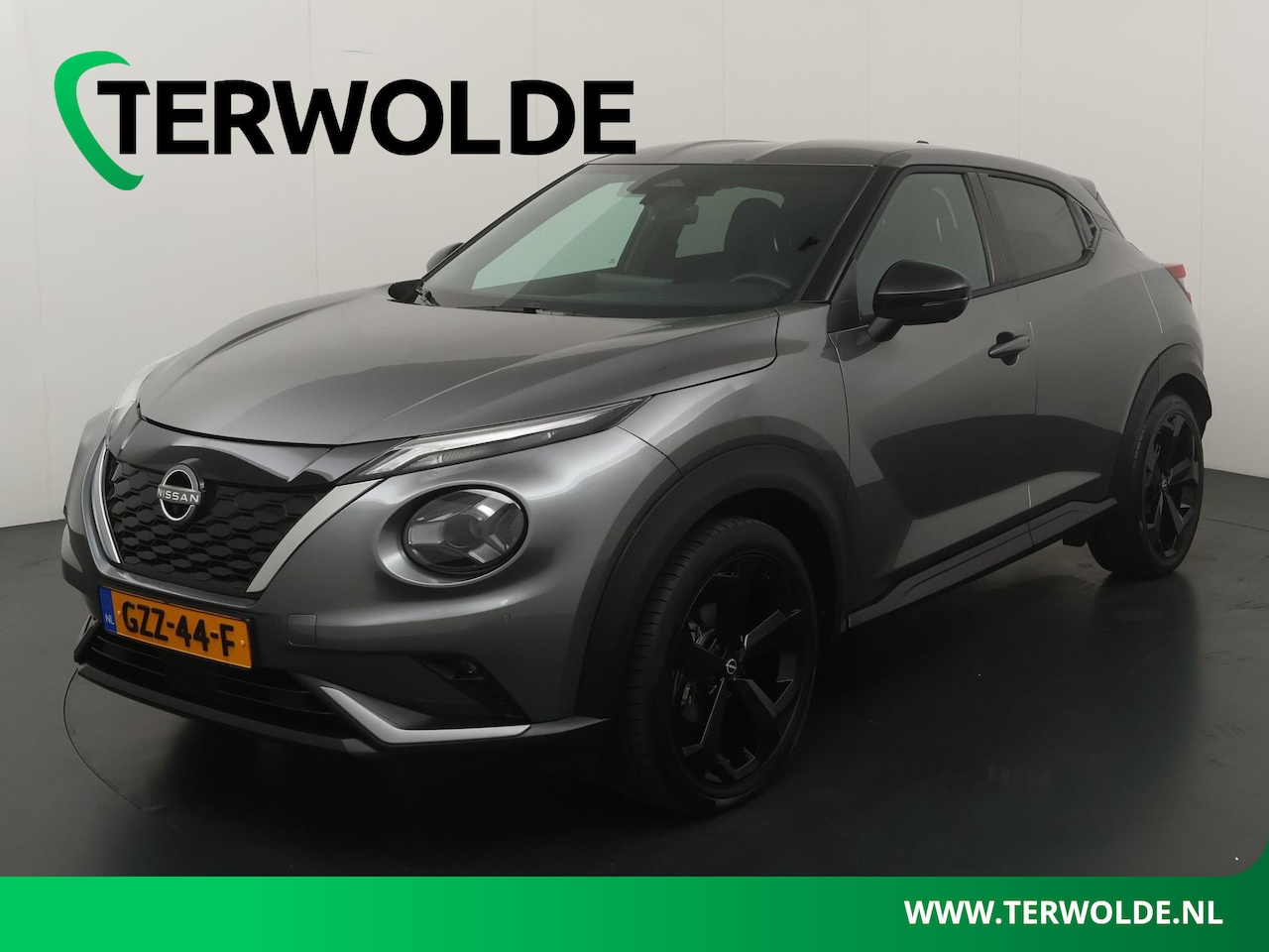 Nissan Juke - 1.6 Hybrid Tekna | Trekhaak | BOSE Audio | - AutoWereld.nl