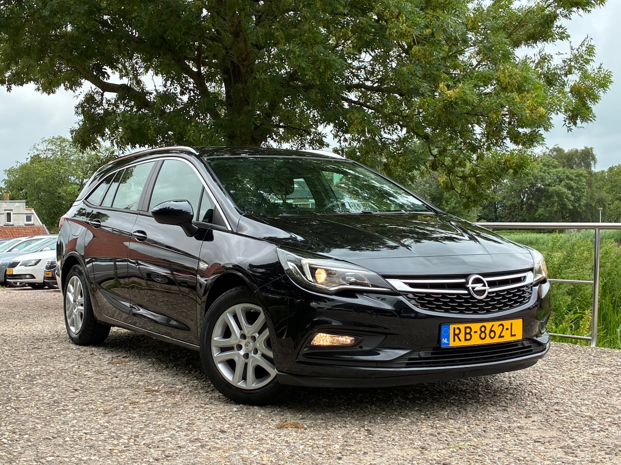 Opel Astra Sports Tourer - 1.4 Business+ | Cruise + Clima nu € 5.450,-!!! - AutoWereld.nl