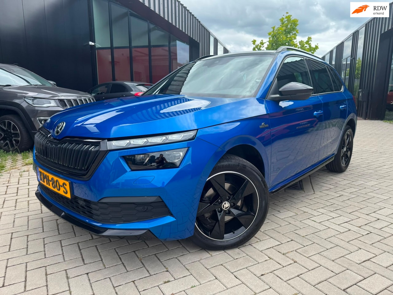 Skoda Kamiq - 1.0 TSI Monte Carlo DSG Pano Clima Navi - AutoWereld.nl