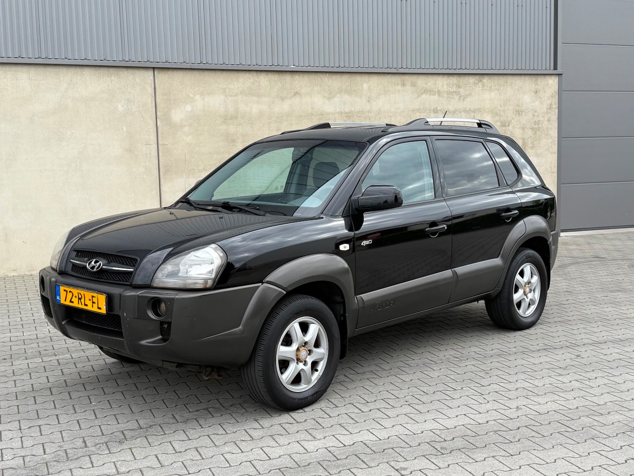 Hyundai Tucson - 2.7i V6 4WD Style NAP+AUTOMAAT+Climate+Cruise+Leder+ Stoelverwarming+Trekhaak+Lm velgen - AutoWereld.nl