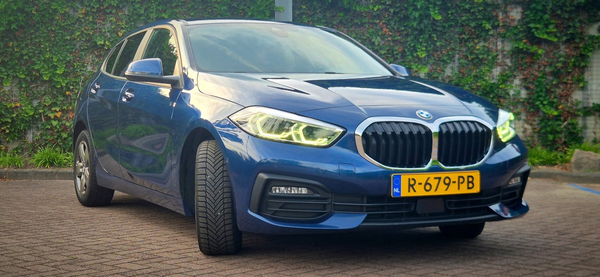 BMW 1-serie - 118i Business Edition | Cam | Stoelverw. | Cruise | Led - AutoWereld.nl