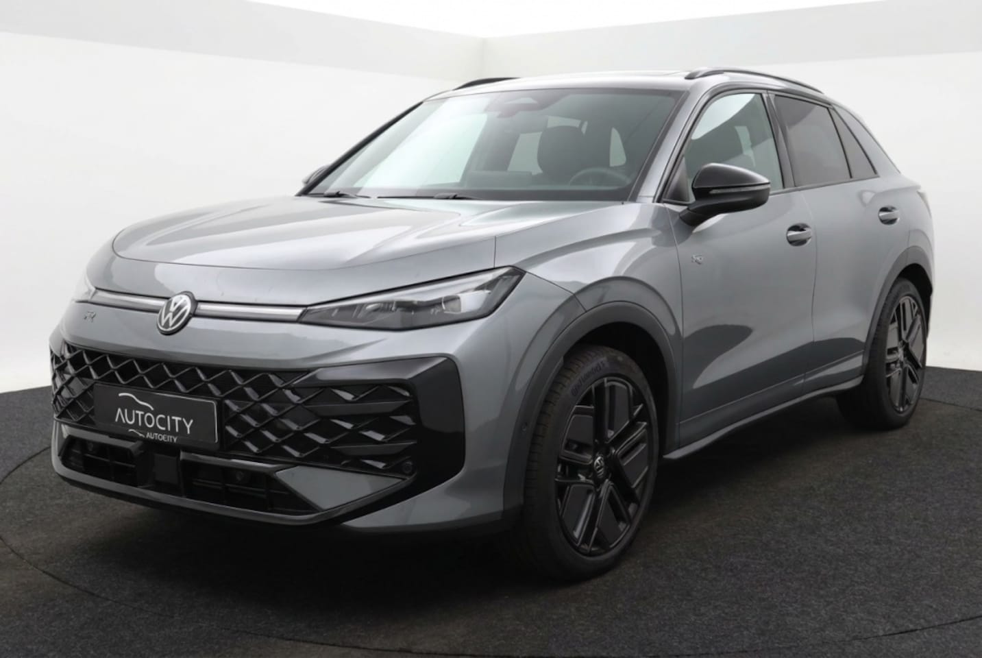 Volkswagen T-Roc - 1.5 TSI R-Line Pano l Camera l Keyless l VOL OPTIES l NIEUW MODE - AutoWereld.nl