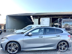 BMW 1-serie - 118i aut High Exe M-Sport - nap - pano - sfeerverl - nav - cam - alarm - stuurverw - front