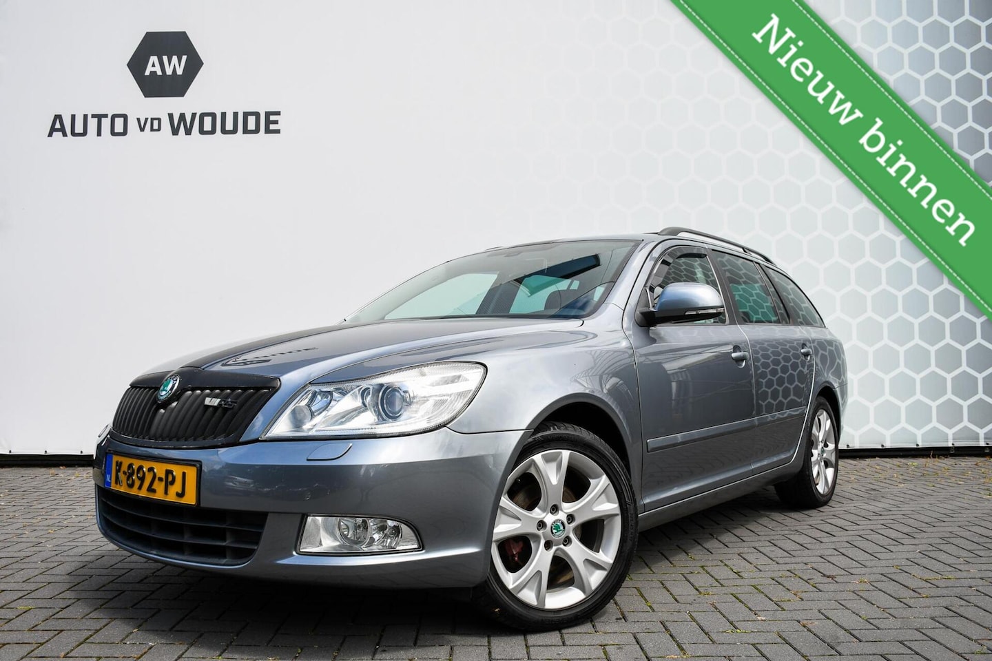 Skoda Octavia Combi - 1.4 TSI Elegance Stoelverwarming Trekhaak - AutoWereld.nl