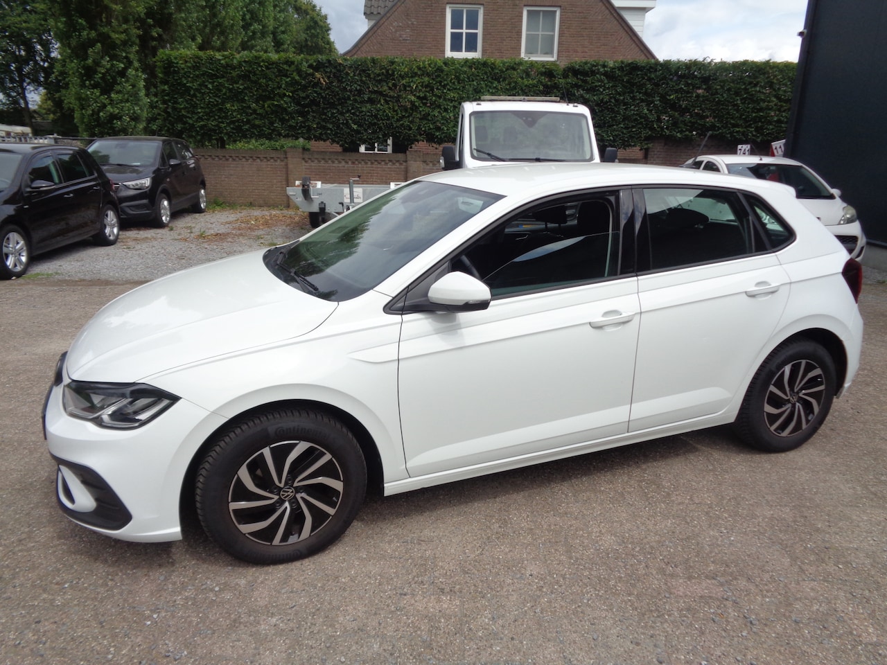 Volkswagen Polo - 1.0 TSI Life Business Ecc, PDC v+a, Navigatie, carplay, LM velgen, stoelverwarming - AutoWereld.nl