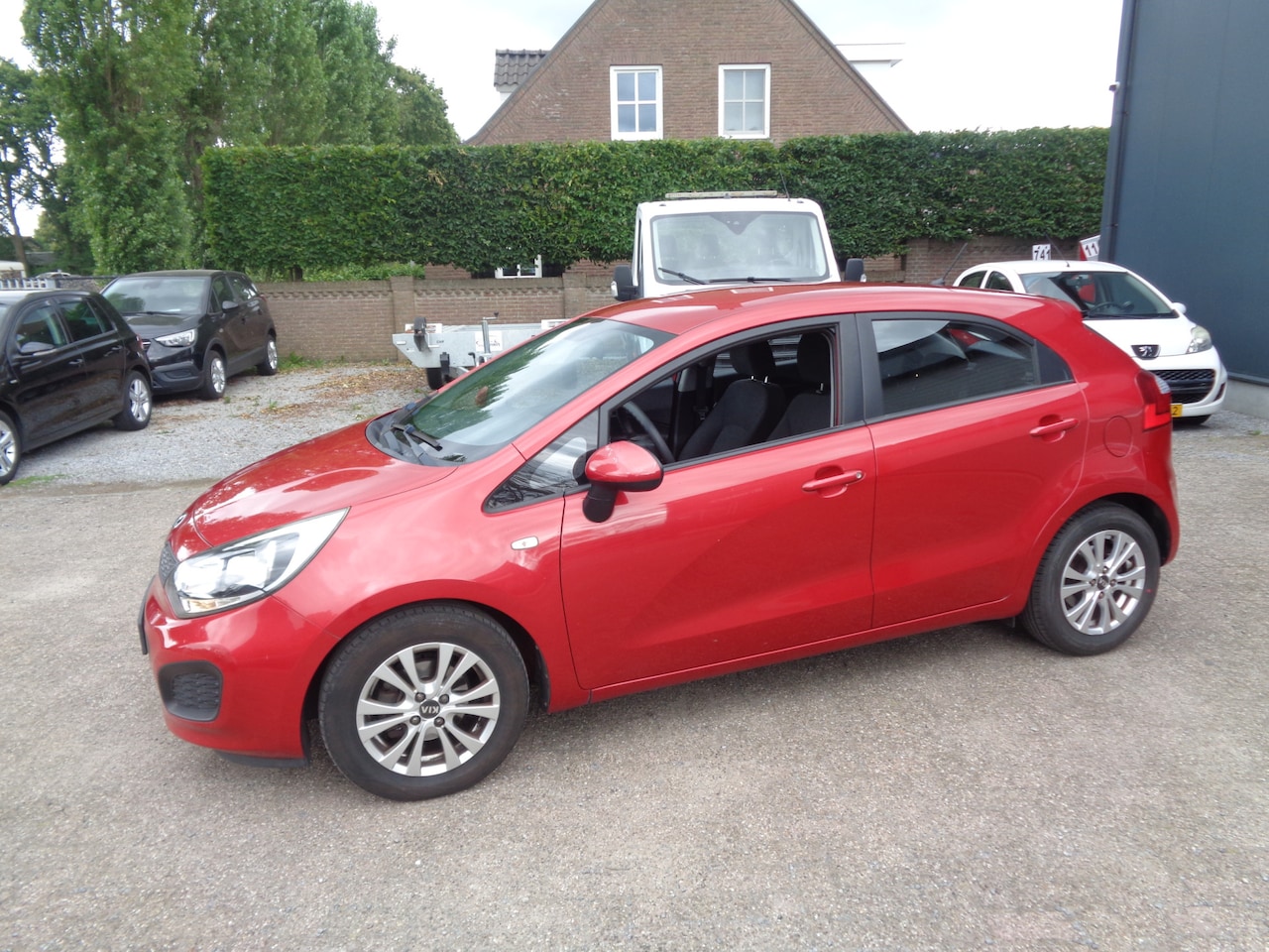 Kia Rio - 1.2 CVVT ComfortLine airco, LM velgen, afneembare trekhaak - AutoWereld.nl