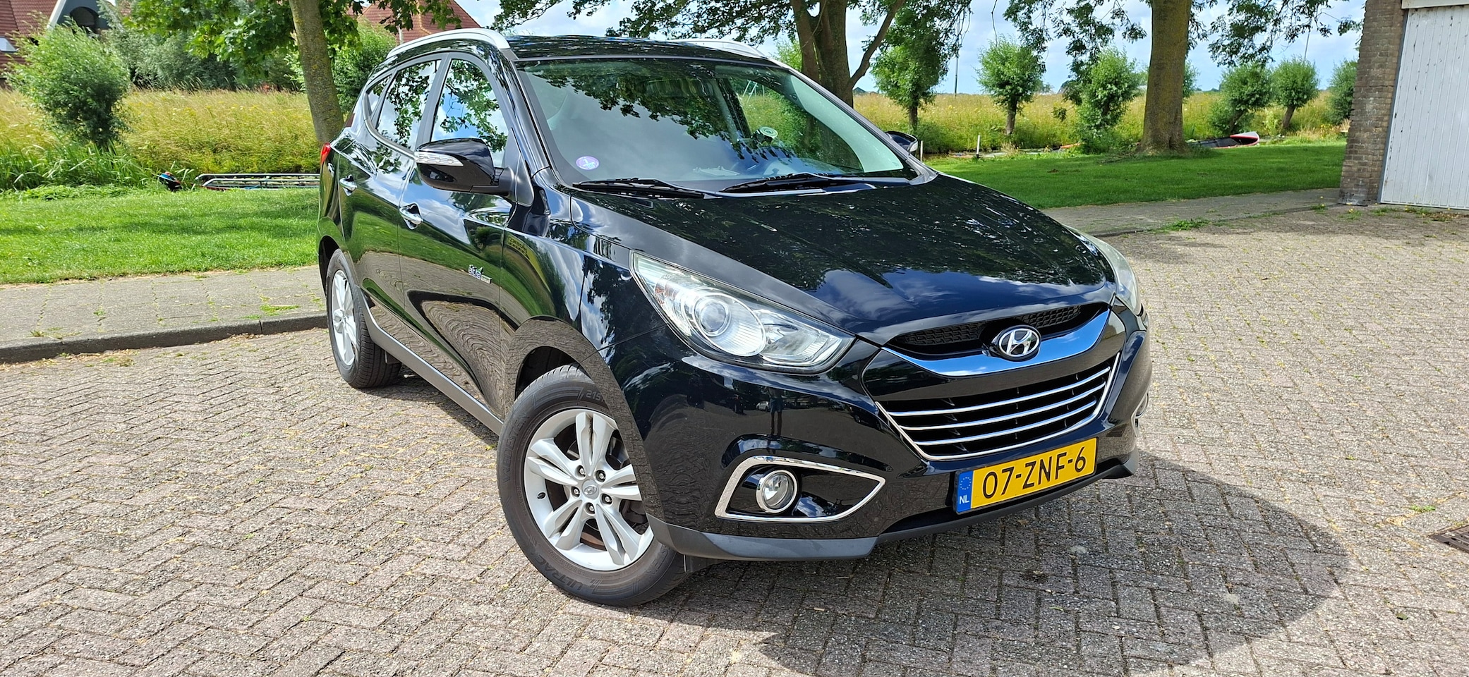 Hyundai ix35 - 1.6i GDI Business Edition Blue style - AutoWereld.nl