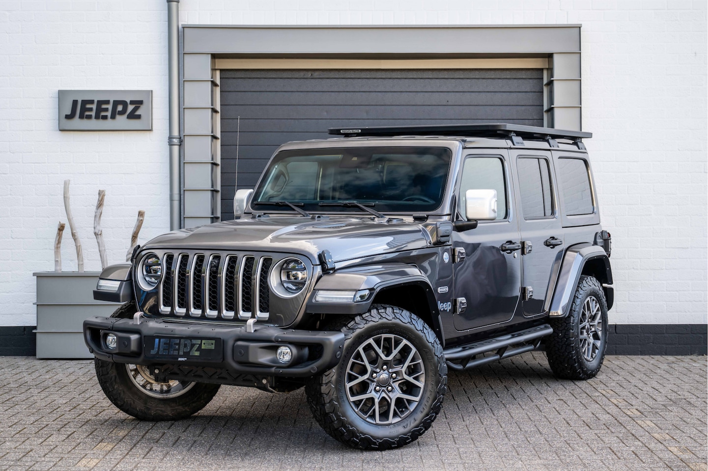 Jeep Wrangler Unlimited - 4xe 380 Overland -Ofd voorbumper - Roof rack - AutoWereld.nl