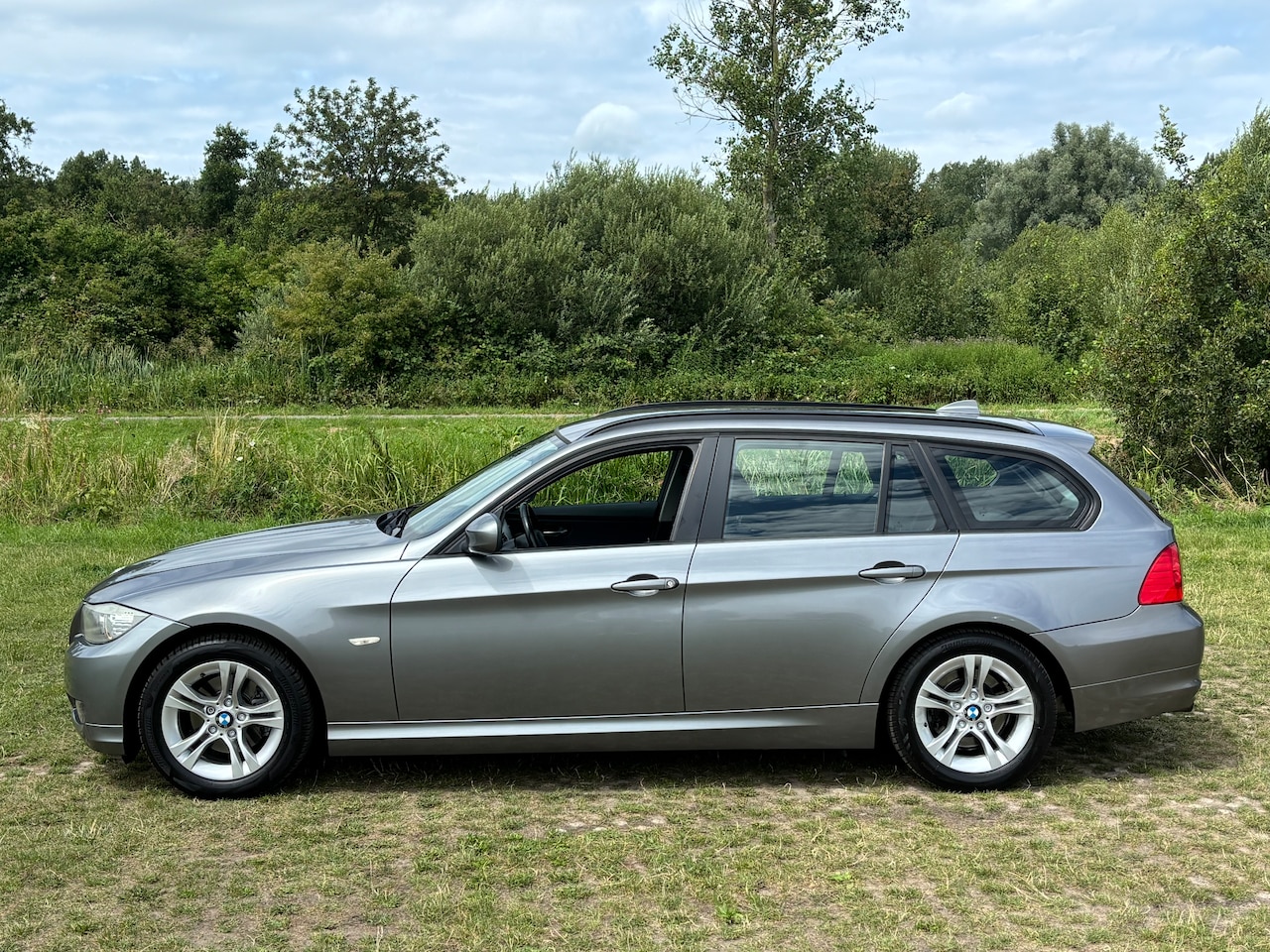 BMW 3-serie Touring - 318i Business Line Navi Cruise Climate Control - AutoWereld.nl