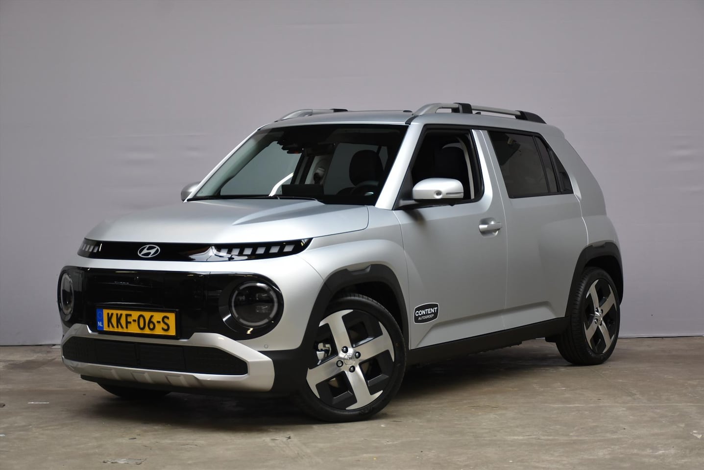 Hyundai Inster - 49 kWh Evolve Sky + Winter en Tech pack - AutoWereld.nl