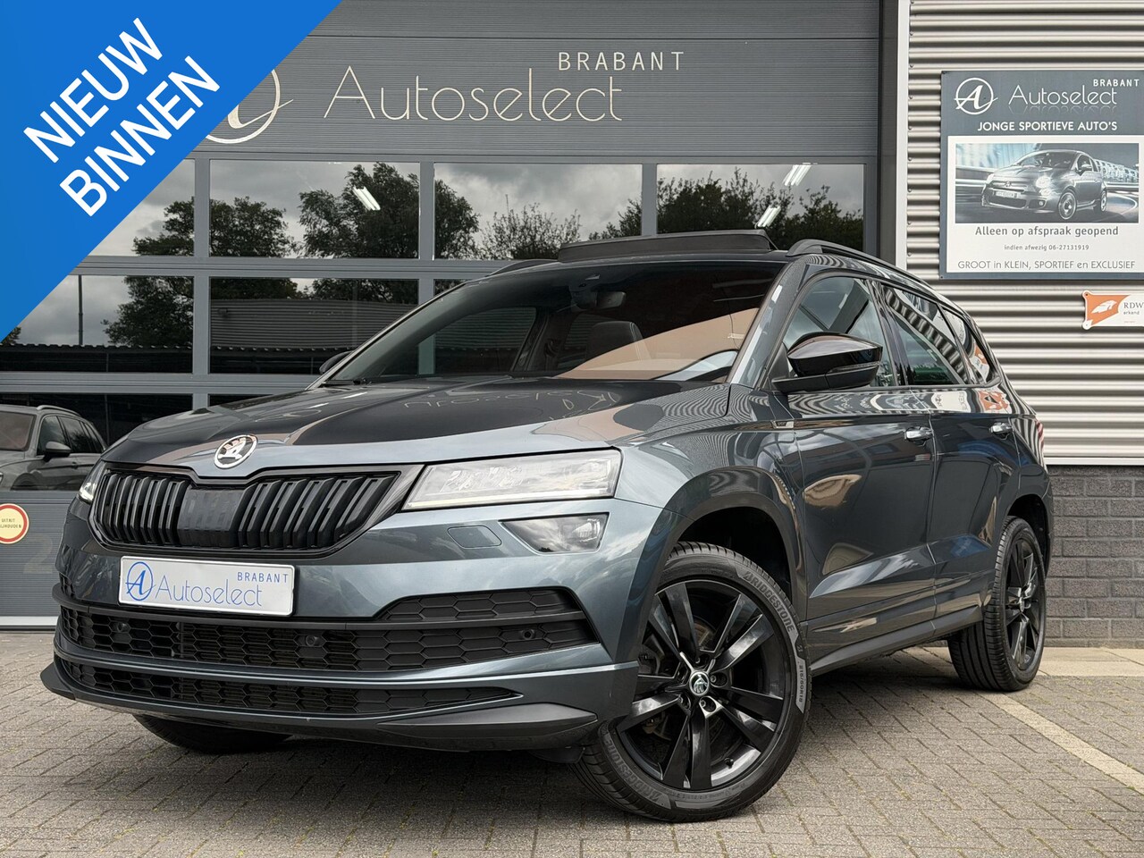 Skoda Karoq - 1.5 TSI ACT Sportline Pano | CarPlay | Dealer OH - AutoWereld.nl