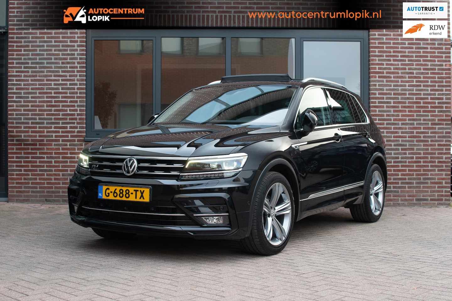 Volkswagen Tiguan - 1.5 TSI ACT Highline Business R|360 camera|Memory|Trekhaak - AutoWereld.nl