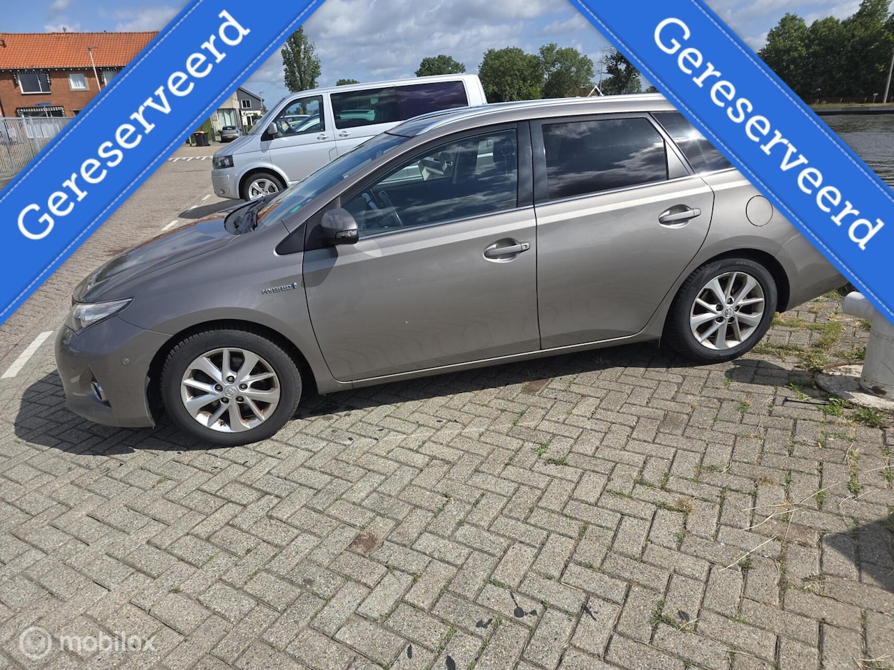 Toyota Auris - 1.8 Hybrid Lease+ Sports AUTOMAAT, PANORAMADAK - AutoWereld.nl