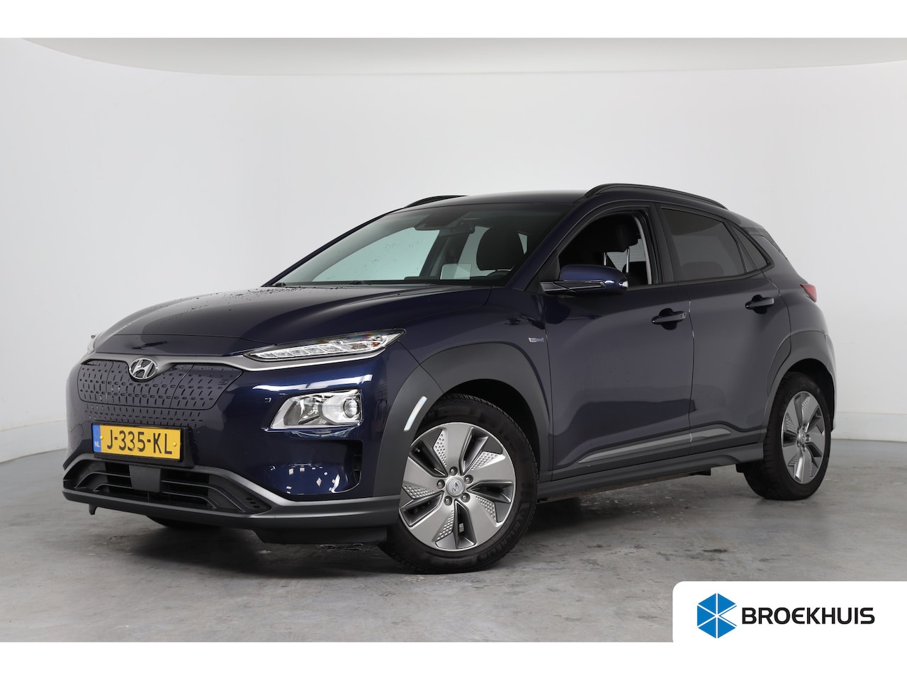 Hyundai Kona Electric - EV Fashion 64 kWh | 1e Eigenaar! | Navi | Camera | Clima | Keyless | HUD | Cruise Adaptive - AutoWereld.nl