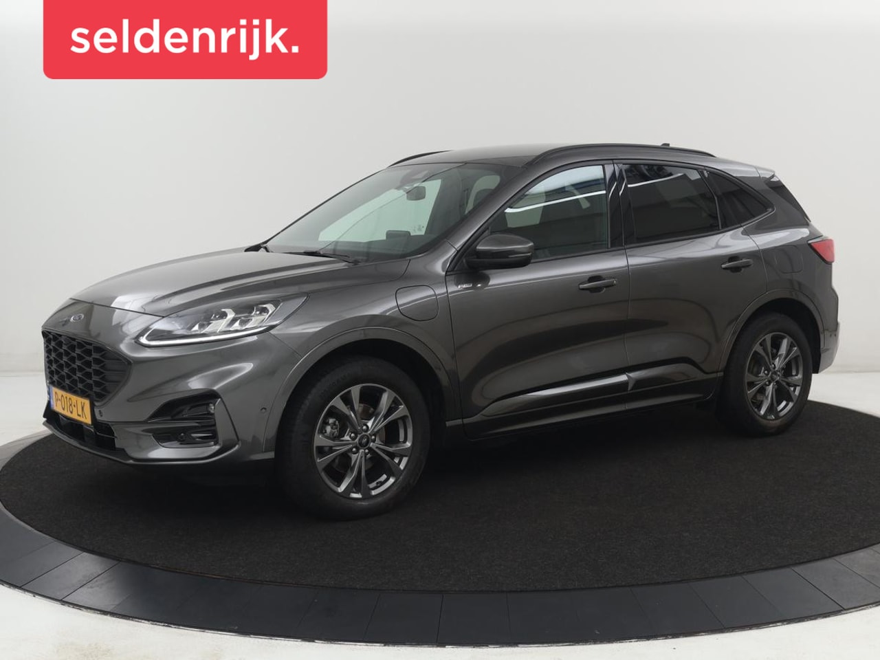 Ford Kuga - 2.5 PHEV ST-Line | SOH 94,5% | Adaptive cruise | Leder/Alcantara | Camera | Carplay | Side - AutoWereld.nl