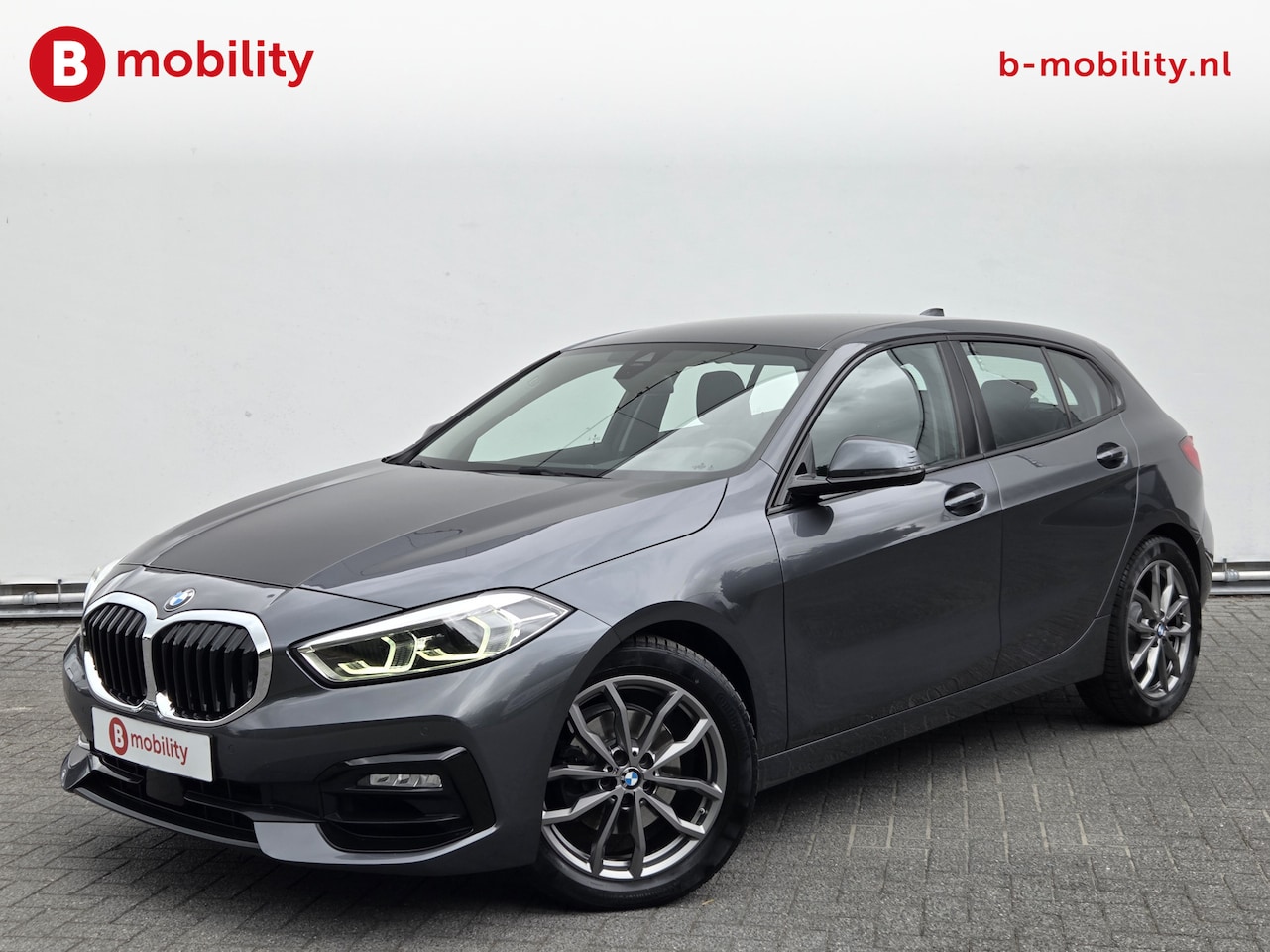 BMW 1-serie - 118i High Executive Sportline Apple CarPlay | Stoelverwarming | Sportstoelen | PDC | Cruis - AutoWereld.nl