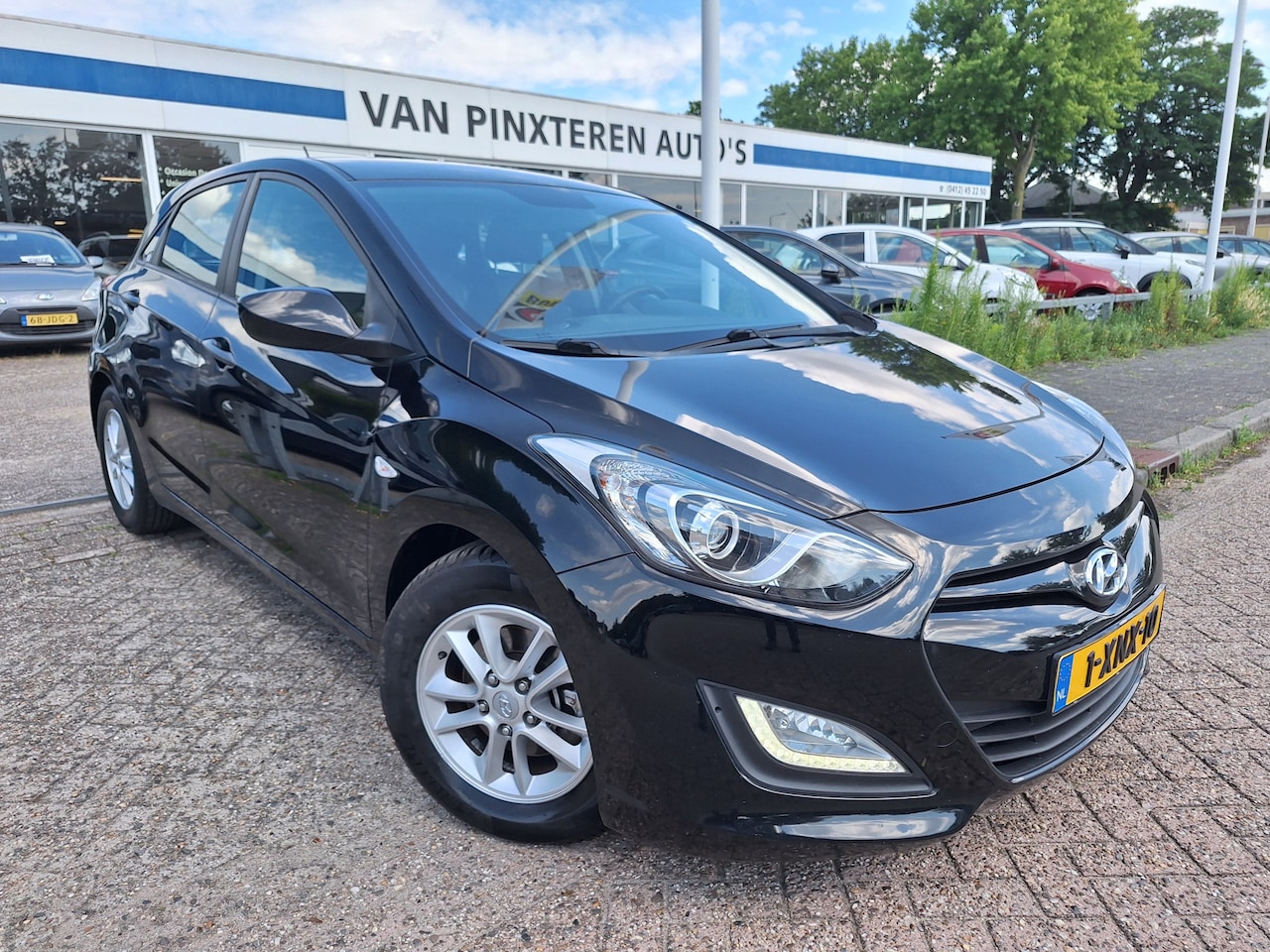 Hyundai i30 - 1.4i i-Motion 1.4i i-Motion - AutoWereld.nl