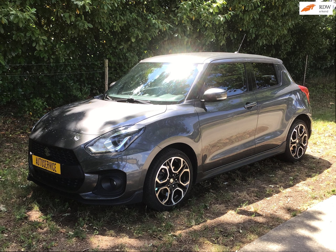 Suzuki Swift - 1.4 Sport Smart Hybrid met verlengde garantie - AutoWereld.nl
