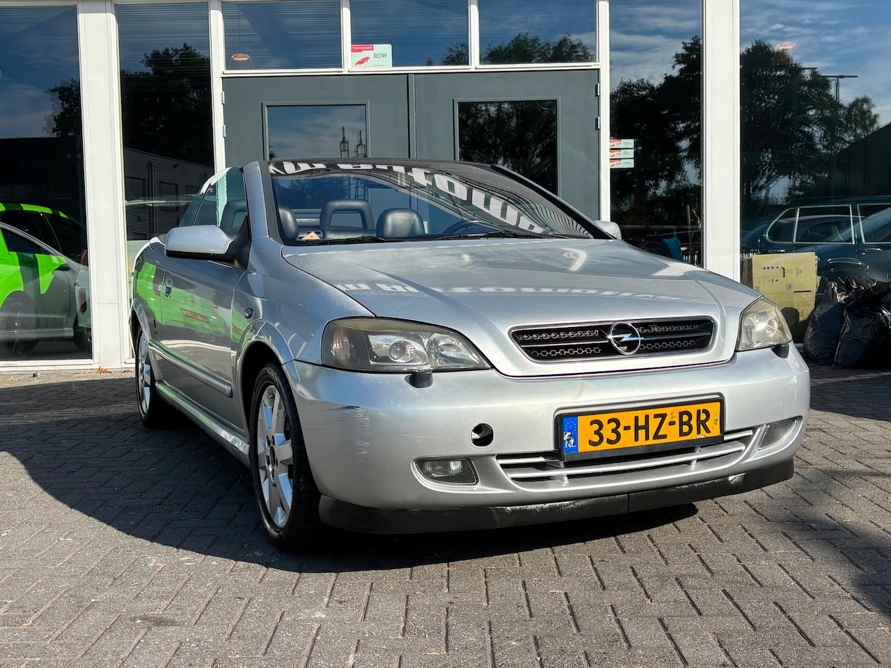 Opel Astra Cabriolet - 1.8-16V / Airco / Lm Velgen / Cruise control / Verwarmde voorstoelen - AutoWereld.nl