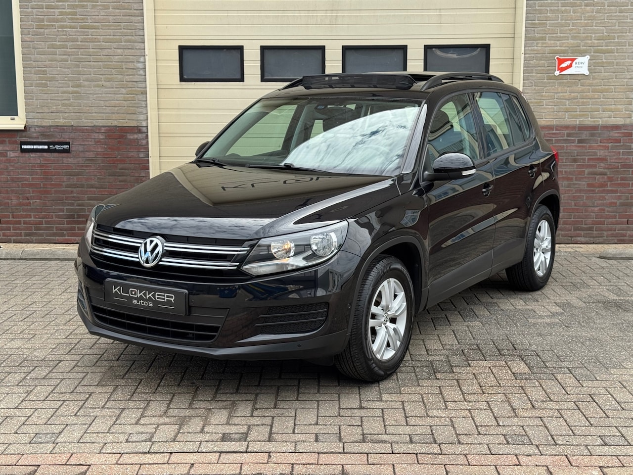 Volkswagen Tiguan - 1.4 TSI Comfort&Design Airco|Clima|Navi|Pano|PDC - AutoWereld.nl