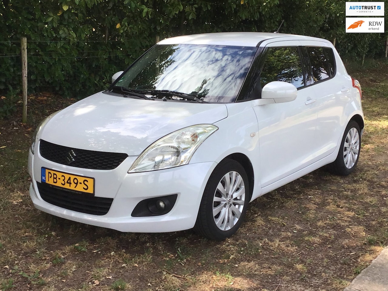 Suzuki Swift - 1.2 Exclusive ICI Paris, leder - AutoWereld.nl
