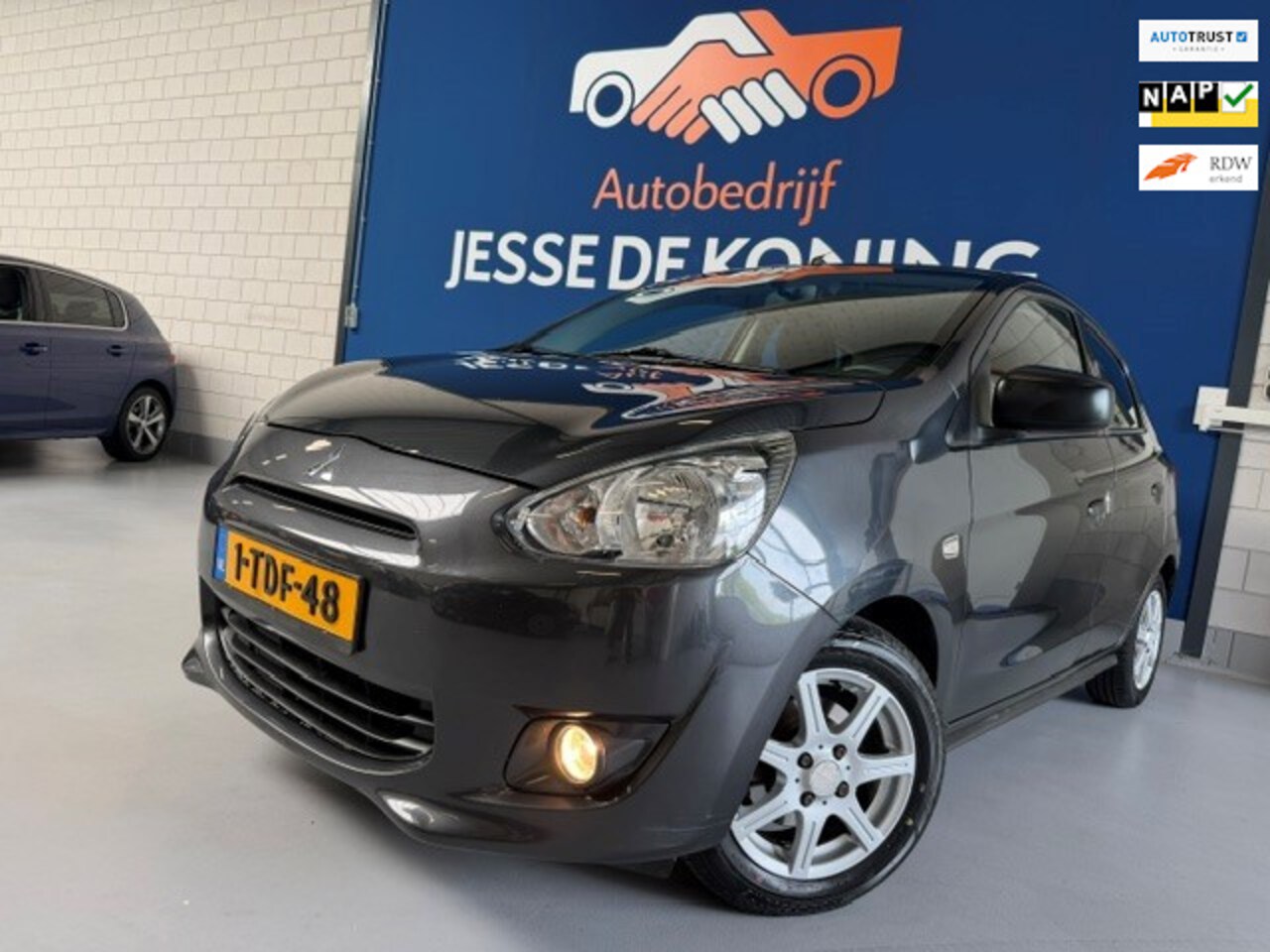 Mitsubishi Space Star - 1.0 Inform / bj.2014 / kleur: grijs / airco / sportvelgen / NAP 147688 km.en APK tot 02/20 - AutoWereld.nl