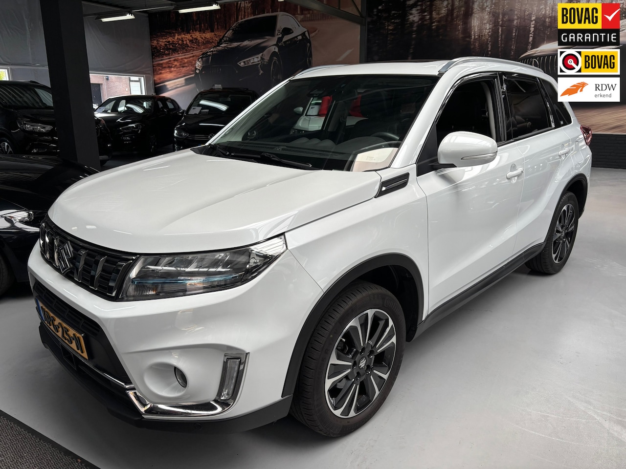 Suzuki Vitara - 1.4 Boosterjet Style Smart Hybrid / Carplay / Panorama Dak - AutoWereld.nl
