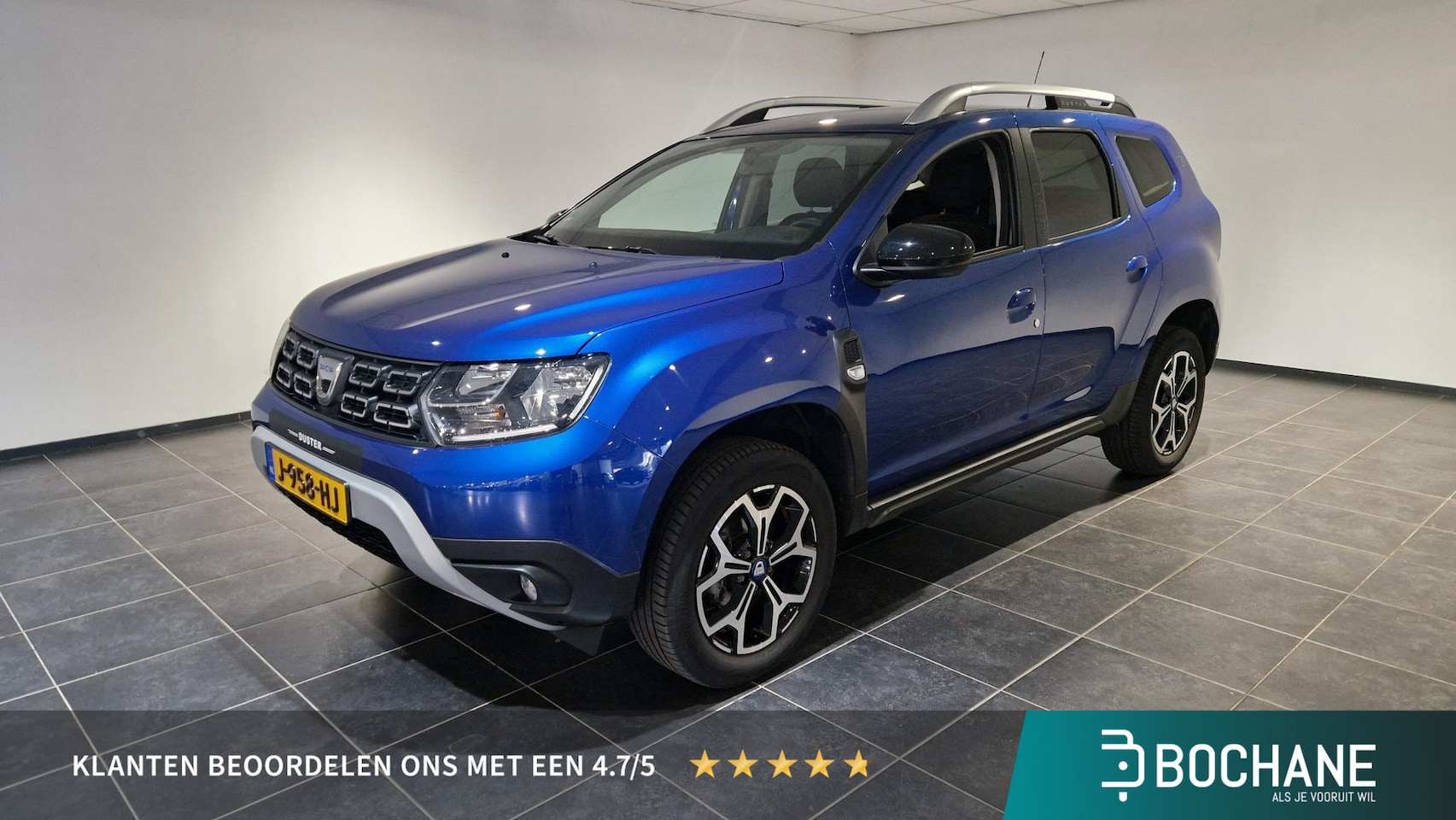 Dacia Duster - 1.0 TCe Bi-Fuel Serie Limitee 15th Anniversary | Navigatie | Camera | Keyless Entry | Clim - AutoWereld.nl