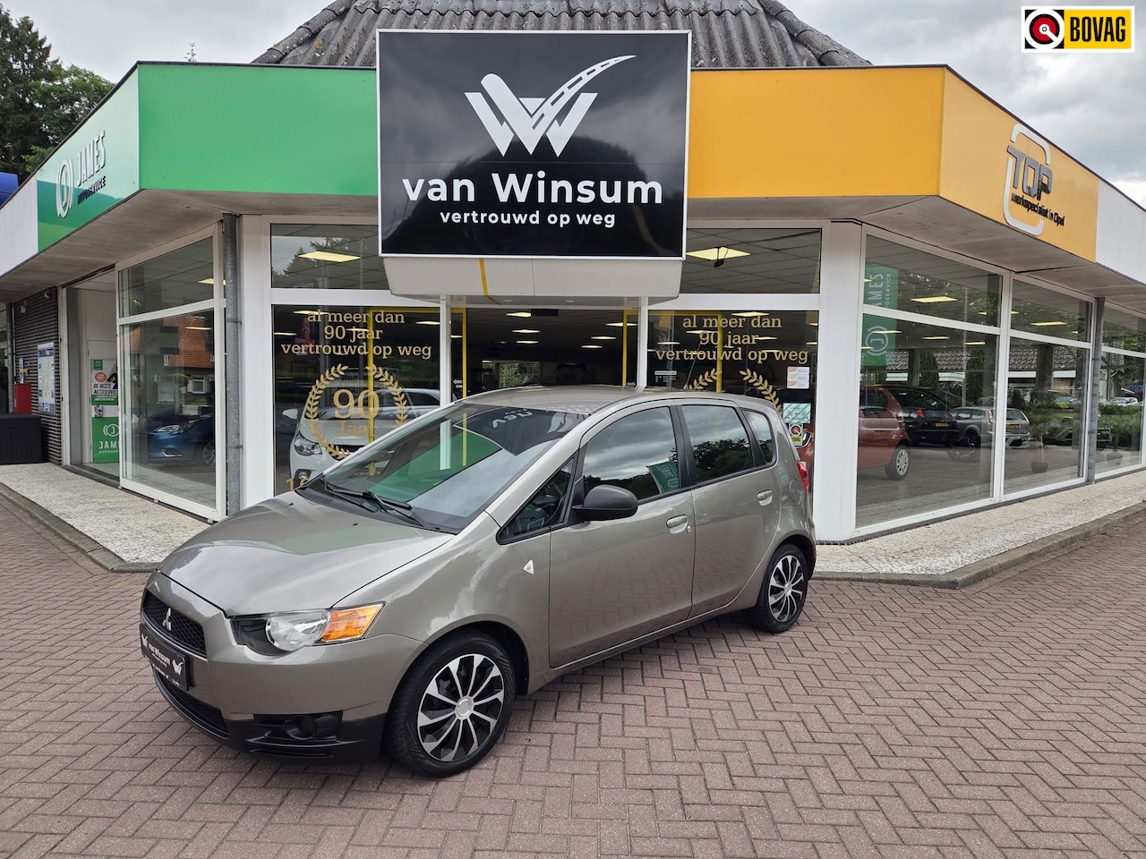 Mitsubishi Colt - 1.1 ClearTec Edition One | Airco | Trekhaak | - AutoWereld.nl