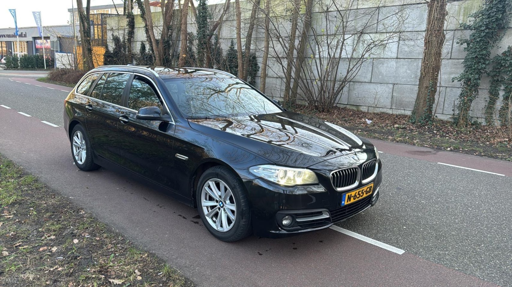 BMW 5-serie Touring - 518d Luxury Edition FACELIFT LEER NAVIAGTIE CLIMA ZWART 2017 - AutoWereld.nl