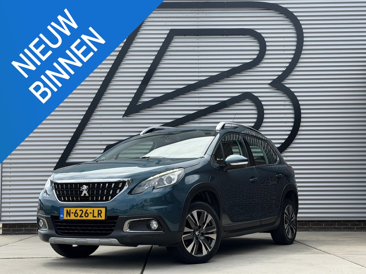 Peugeot 2008 - 1.2 PureTech Allure 2e Eigenaar|Navi|Clima|Trekhaak|Cruise|Stoelverwarming|PDC|APK tot 03- - AutoWereld.nl