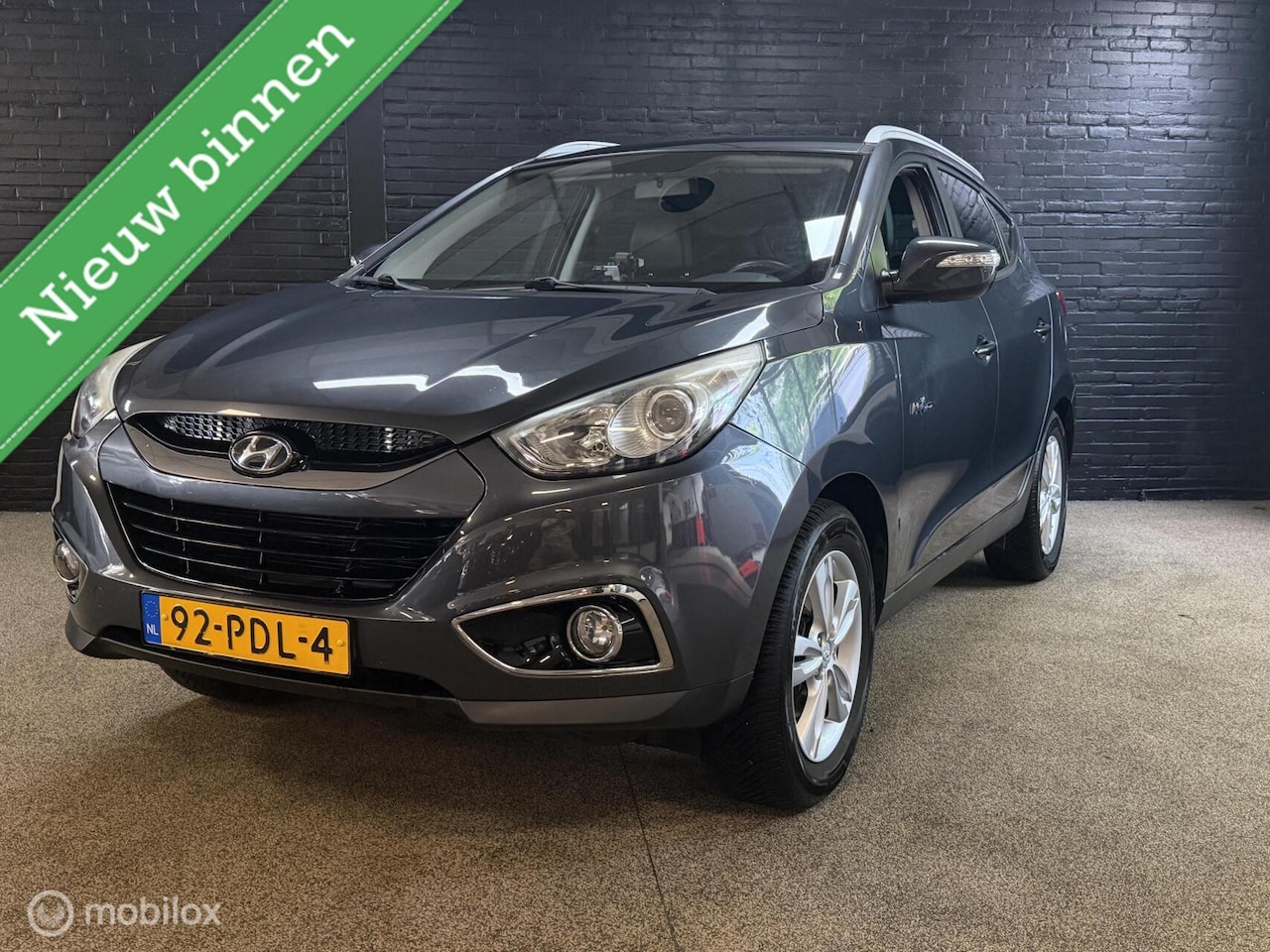 Hyundai ix35 - 1.6i GDI Active LEDER TREKHAAK CAMERA CRUISE - AutoWereld.nl